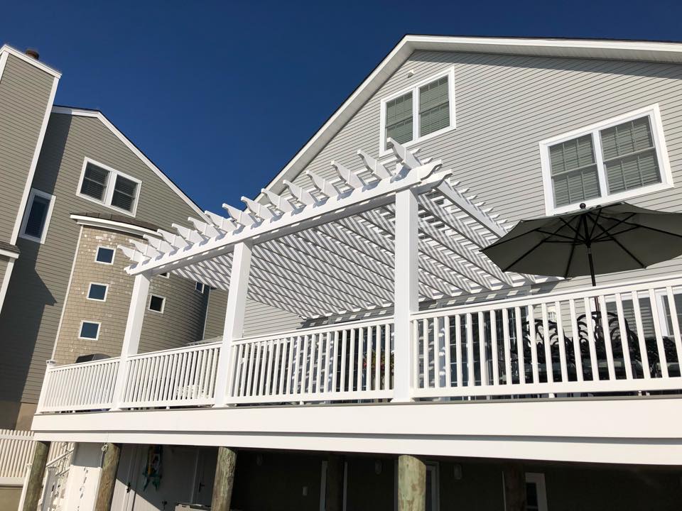White Fencing Over Patio